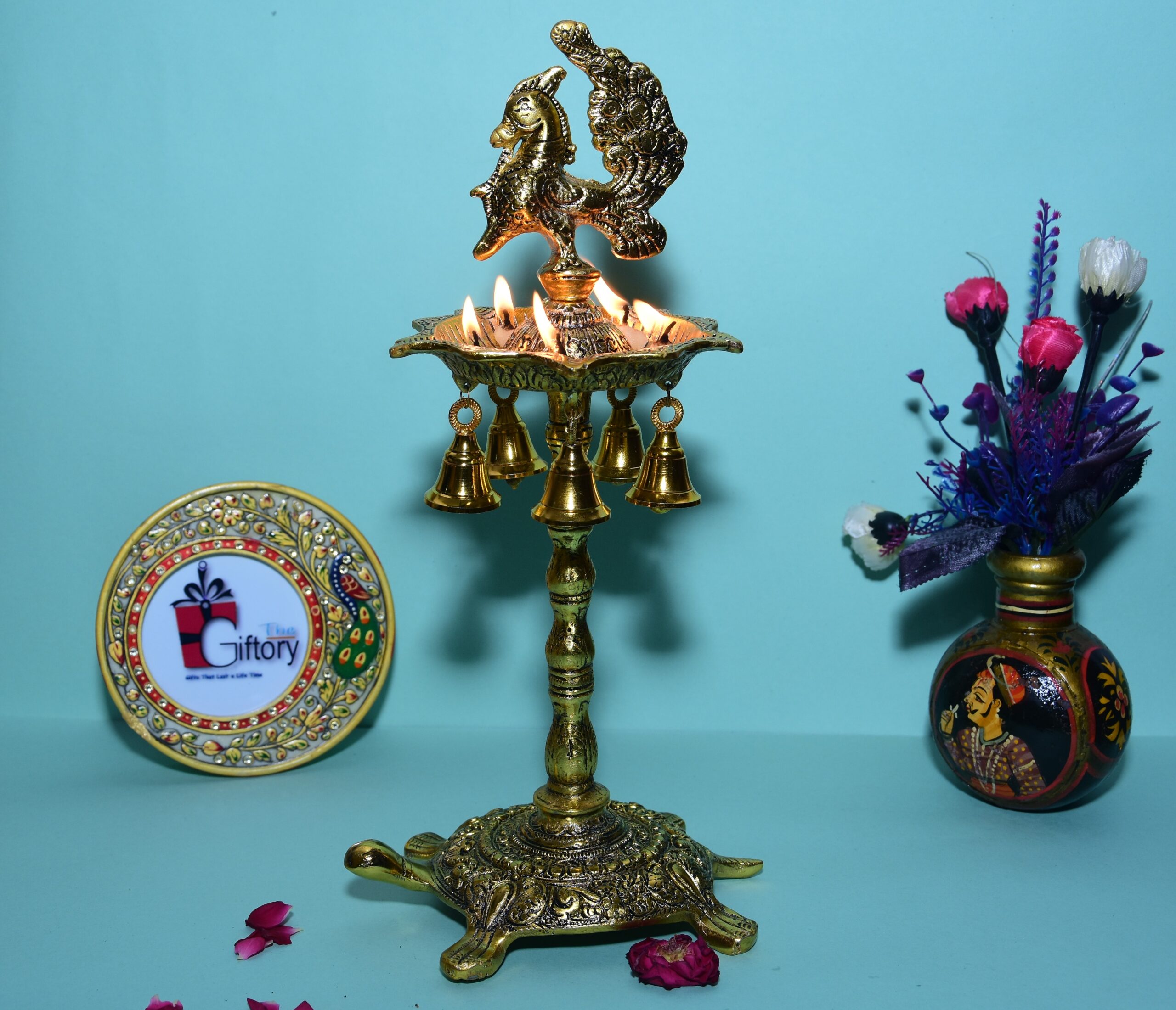 Metal Golden Peacock Oil Lamp Diya with Tortoise Bottom Stand