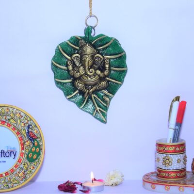 Lord Ganesha On Green Leaf