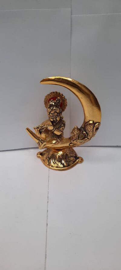 Auspicious Golden Metal Bal Gopal Krishna on Crescent Moon Statue - Decorative Lord Krishna Playing Flute Figurine for Car Dashboard, Pooja Mandir & Festive Return Gifting By The Giftory