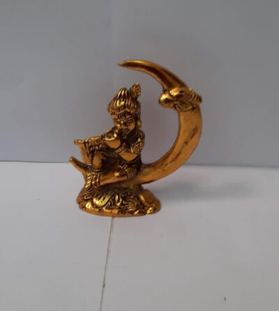 Auspicious Golden Metal Bal Gopal Krishna Sitting on Crescent Moon Statue - Decorative Lord Krishna Playing Flute Figurine for Car Dashboard, Pooja Mandir & Festive Return Gifting By The Giftory